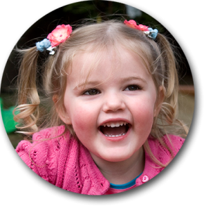 Smiling child with bunches in her hair